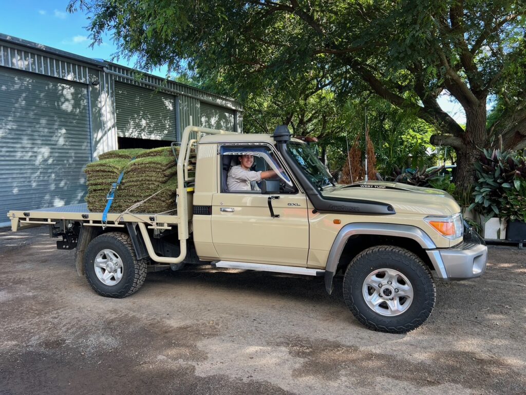 man in truck delivering zoysia turf