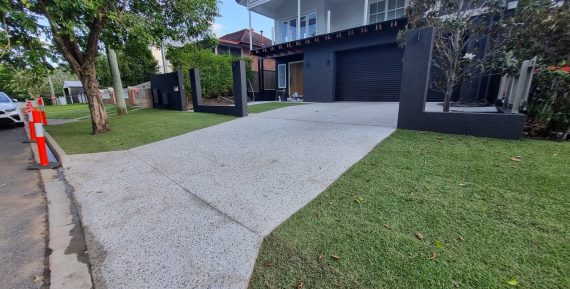 large modern house with grassy front yard